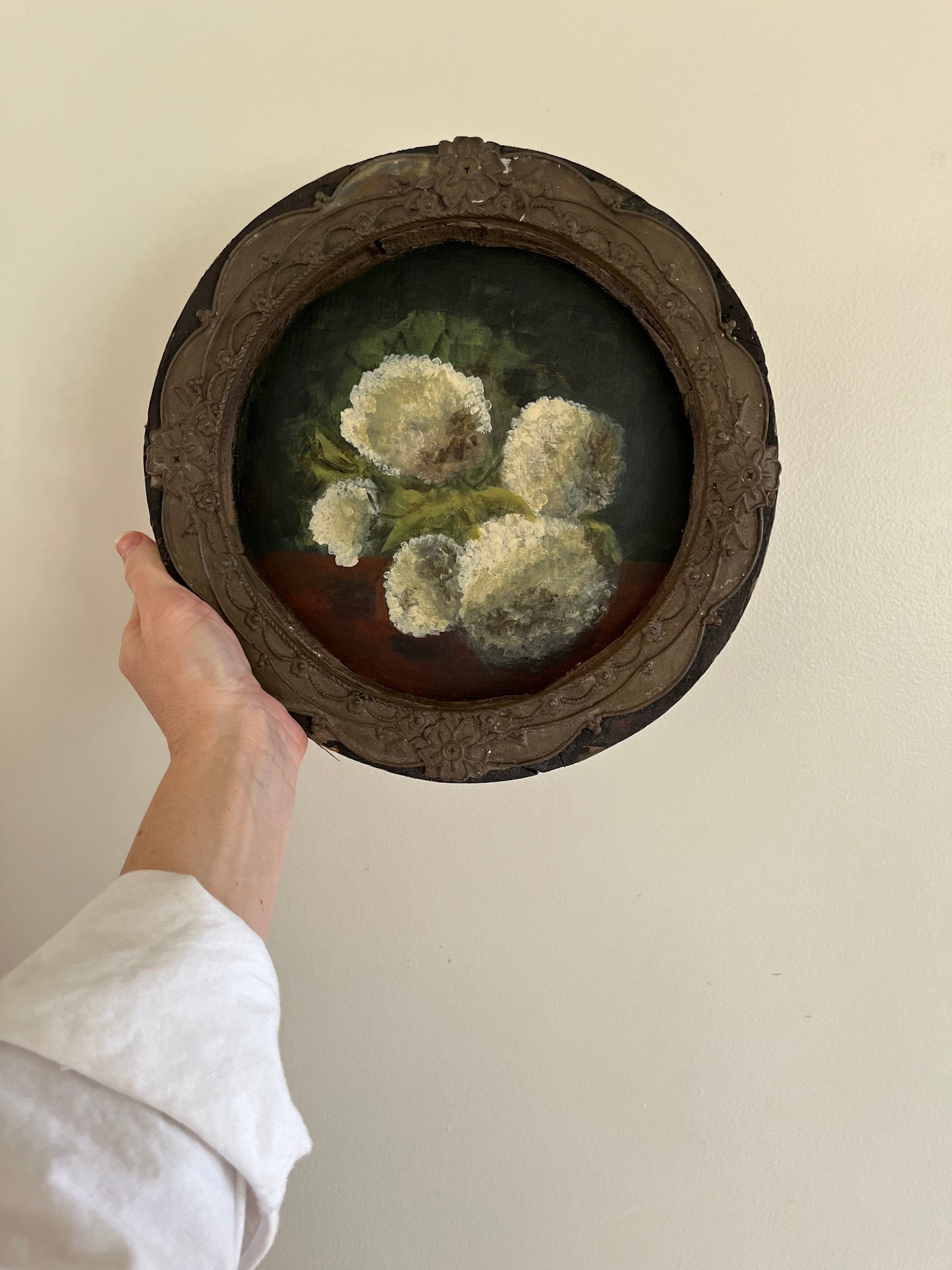 Hydrangea still life on vintage round wood