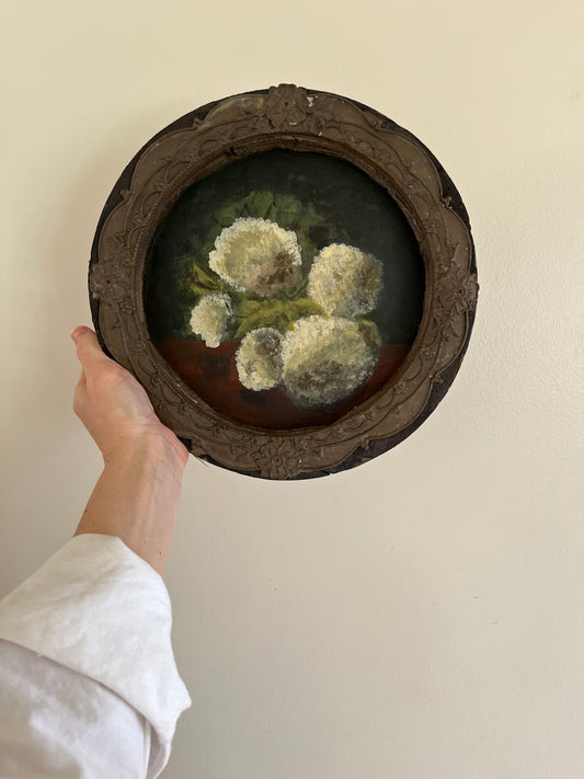 Hydrangea still life on vintage round wood